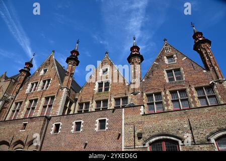 Pointed Gables and Brick Facades in Bruges’ Historic Center - Belgium Stock Photo