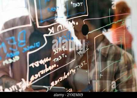 Portrait of african american female IT developer, programmer, designer working with programming code Stock Photo