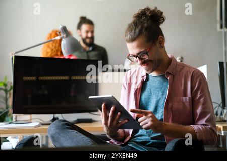 Success business man with tablet, analytics and developer for startup business website IT software Stock Photo
