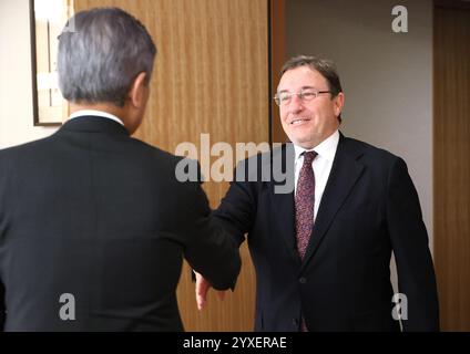 Tokyo, Japan. 16th Dec, 2024. United nations Development Program (UNDP) administrator Achim Steiner (R) shakes hands with Japanese Foreign Minister Takeshi Iwaya (L) prior to their talks at Iwaya's office in Tokyo on Monday, December 16, 2024. Steiner is in Tokyo for the commemoration of the 70th anniversary of Japan's Official Development Assistance (ODA). (photo by Yoshio Tsunoda/AFLO) Credit: Aflo Co. Ltd./Alamy Live News Stock Photo