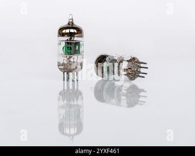 Zaporizhzhia, Ukraine - August 4, 2024: 7-Pin General Electric GE 5654W vacuum tubes isolated on white background with reflection Stock Photo