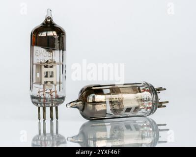 Zaporizhzhia, Ukraine - August 25, 2024: Close-up of an old Soviet radio tube 6Zh38P isolated on a white background with reflection Stock Photo