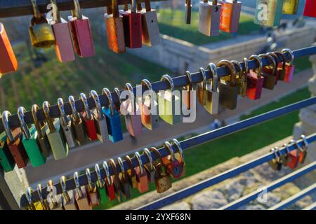 love padlocks on the city wall of the Petersberg citadel in erfurt, germany Stock Photo