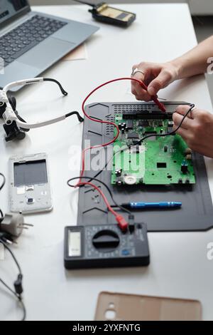 Testing Circuit Board in Laboratory Setting Stock Photo