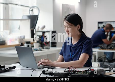 Working in Technology Laboratory on Modern Devices Stock Photo