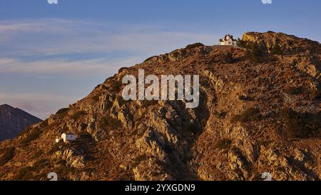 Two churches on a barren, rocky mountainside at sunrise, mountain villages Aperi and Volada, morning light, Karpathos, Dodecanese, Greek Islands, Gree Stock Photo
