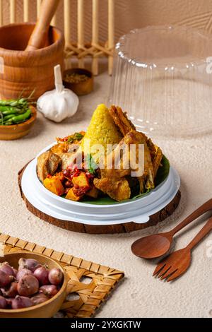 Nasi Tumpeng or Cone Shaped Yellow Rice Traditional Food from Indonesia ...