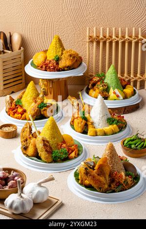 Nasi Tumpeng or Cone Shaped Yellow Rice Traditional Food from Indonesia ...