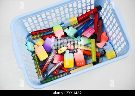 Disposable vapes in bin Stock Photo