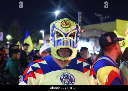 Mexico City, Mexico. 16th Dec, 2024. Hundreds of Club America fans attend at the Coyote Monument in Ciudad Nezahualcóyotl, to celebrating after Club America won the first three-time champion in short tournaments and the 16th in its history. on December 15, 2024 in Mexico City, Mexico. (Photo by Carlos Santiago/ Credit: Eyepix Group/Alamy Live News Stock Photo