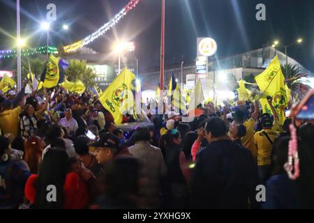 Mexico City, Mexico. 16th Dec, 2024. Hundreds of Club America fans attend at the Coyote Monument in Ciudad Nezahualcóyotl, to celebrating after Club America won the first three-time champion in short tournaments and the 16th in its history. on December 15, 2024 in Mexico City, Mexico. (Photo by Carlos Santiago/ Credit: Eyepix Group/Alamy Live News Stock Photo