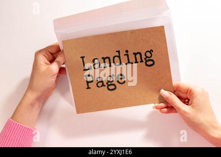 Landing page written in a notebook. Stock Photo