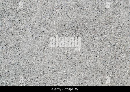Abstract Texture of a Weathered Pavement Wall with Detailed Patterns and Subtle Color Variations Stock Photo