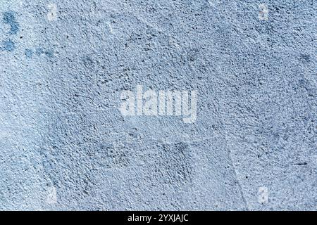 Abstract Texture of a Weathered Pavement Wall with Detailed Patterns and Subtle Color Variations Stock Photo