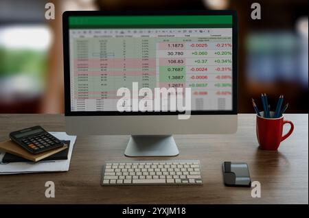 spreadsheet man working with data and graphs Microsoft Excel project dashboard on computer Stock Photo
