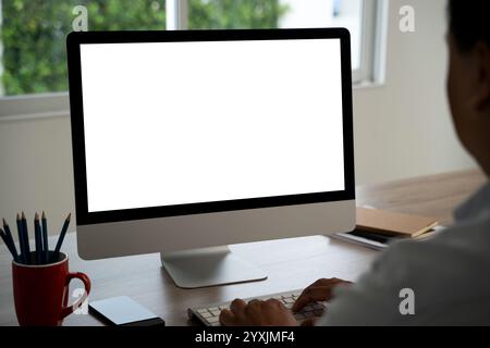 man working Businessman using a desktop computer of the blank screen with hands Stock Photo