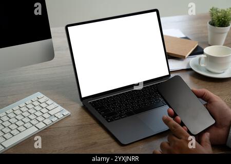 mock up Using laptop with blank screen computer modern Stock Photo