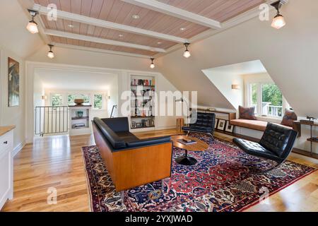 High end remodeled attic is turned into beautiful living space Stock Photo