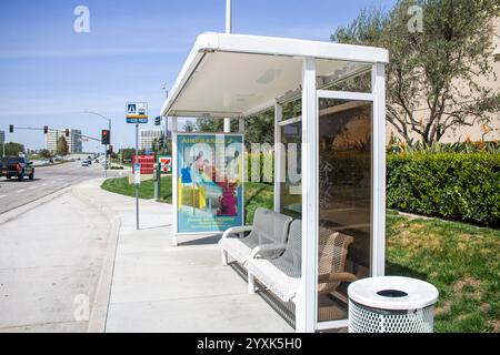 Irvine, California, United States - 03-29-2019: A view of a city bus stop. Stock Photo