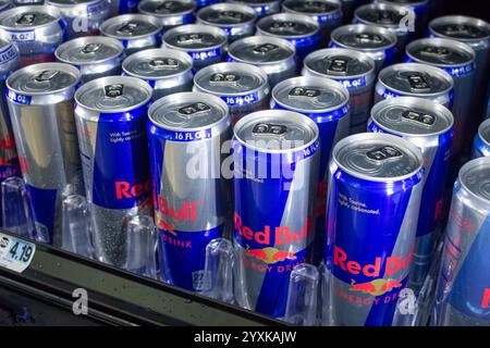 Los Angeles, California, United States - 04-05-2019: A view of several cans of Red Bull energy drink, on display at a local convenient store. Stock Photo