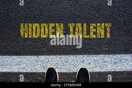 Hidden talent message written on asphalt road. Conceptual hidden talent symbol. Copy space. Stock Photo