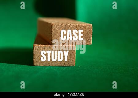 Case study message written on wooden blocks with green background. Conceptual case study symbol. Copy space. Stock Photo