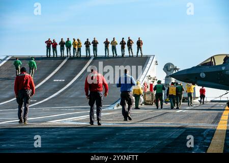 Italian Navy Personnel During Pre-flight Operations On The Deck Of The 