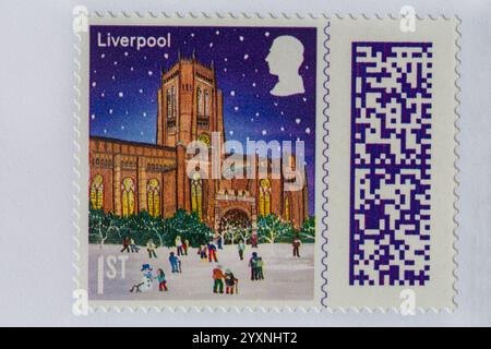 1st class Christmas stamp stuck on envelope - stamp barcoded, stamp barcode UK Stock Photo