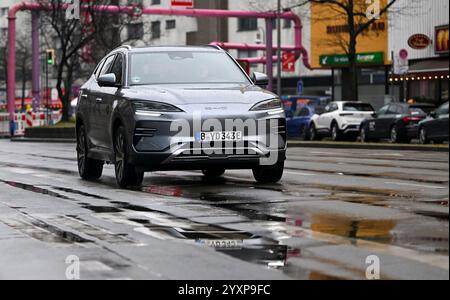 Berlin, Germany. 06th Dec, 2024. A BYD Seal U car drives along Kurfürstenstrasse. The name BYD comes from the abbreviation of the Latinized Chinese company name Biyadí. BYD now also stands for the company slogan Build Your Dreams. Credit: Jens Kalaene/dpa/Alamy Live News Stock Photo