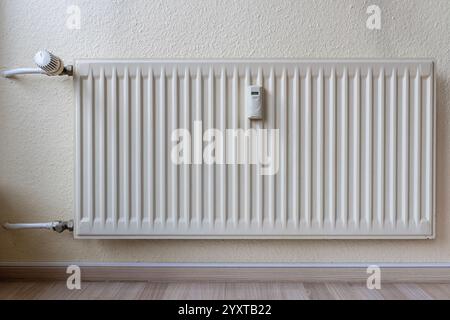 wall mounted radiator in private household Stock Photo