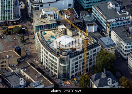 Aerial view, shopping center with construction site on the roof, Kennedyplatz, city center, Essen, Ruhr area, North Rhine-Westphalia, Germany Stock Photo