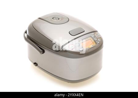Rice cooker, Kitchen equipment electronic tools on white background. Stock Photo