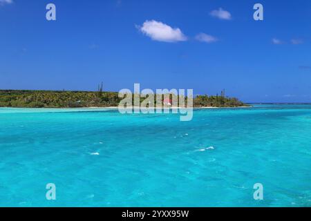 View of Faiava Island from  Ouvea, Loyalty Islands, New Caledonia. Faiava Island has a land area of only around 50 acres. Stock Photo