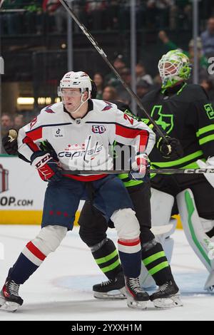 Washington Capitals center Aliaksei Protas (21) skates on the ice ...