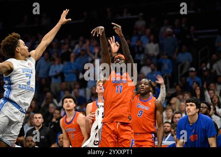 Florida guard Denzel Aberdeen (11) falls with the ball against the ...