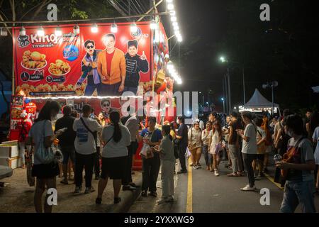 Bangkok, Thailand - December 17, 2024: People at the Thai Red Cross Fair in Lumpini Park in Bangkok, Thailand. Stock Photo