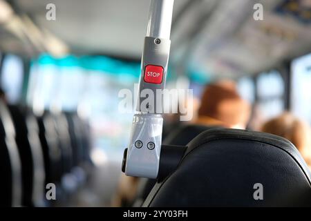 red stop button on bus interior, norfolk, england Stock Photo