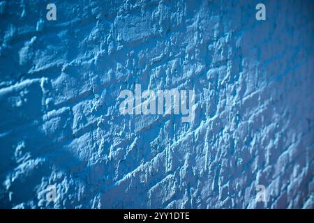 Textured Blue Brick Wall in Urban Setting Eye-Level View Stock Photo