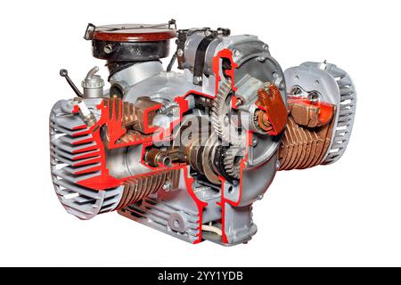 Exploring the intricate design of a classic two-stroke engine in detailed cross-section, isolated on white background. Stock Photo