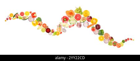 Falling fruits and vegetables in form of wave isolated on white background. Stock Photo