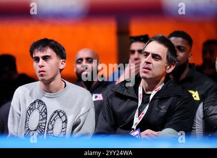 Ronnie O'Sullivan (right) at Boulevard World, Riyadh in Saudi Arabia. Picture date: Wednesday December 18, 2024. Stock Photo