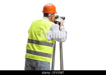 Rear view shot of a geodetic surveyor using a measuring instrument isolated on white background Stock Photo