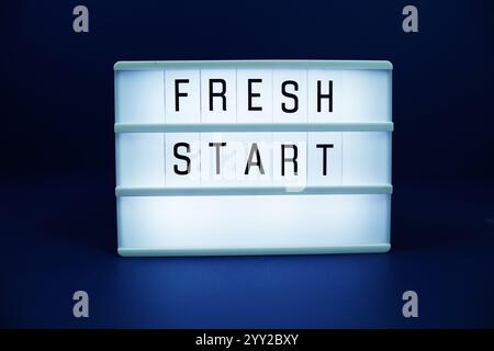 Fresh Start letterboard text on LED Lightbox on blue background Stock Photo