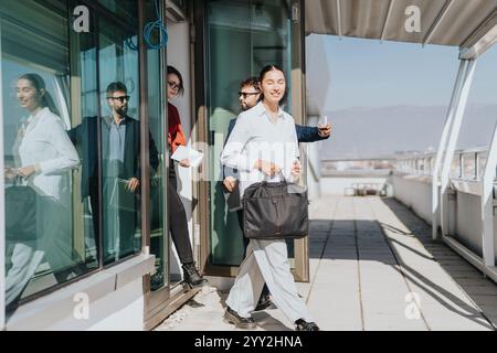 Business people enjoying a break on a modern rooftop terrace Stock Photo