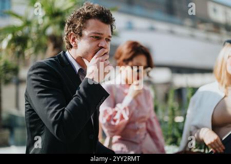 Multicultural business team in outdoor city meeting discussing strategies Stock Photo