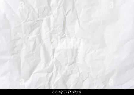 Top view and full frame of wrinkled or crumpled white stencil paper texture is used for wrinkled or crumpled white paper background texture Stock Photo