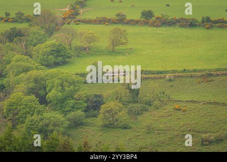 Near Agneash, Garff, Isle of Man - May 21, 2023: A Snaefell Mountain Tramway train traveling between Laxey and Snaefell Summit Stock Photo