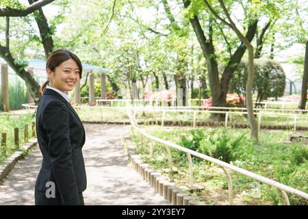 Young businesswoman doing sales with a smile Stock Photo