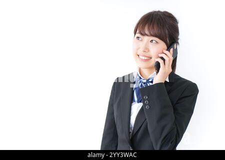 High school girl using a smartphone Stock Photo