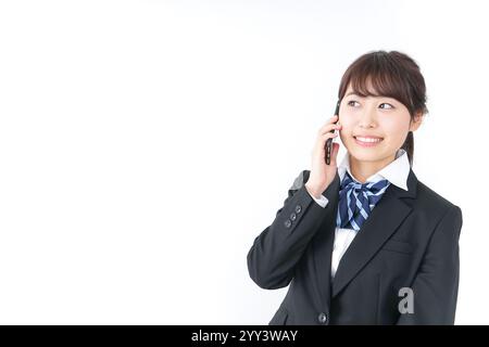 High school girl using a smartphone Stock Photo